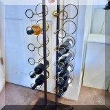 D20. Metal wine rack.